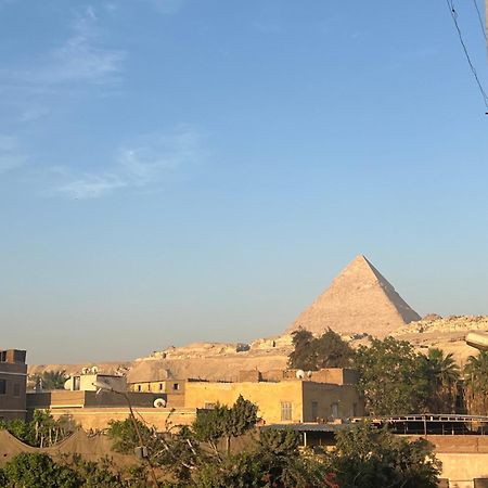 Global Pyramids View Inn Kafret el-Gabal Exterior foto