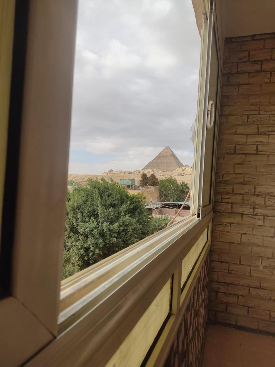 Global Pyramids View Inn Kafret el-Gabal Exterior foto